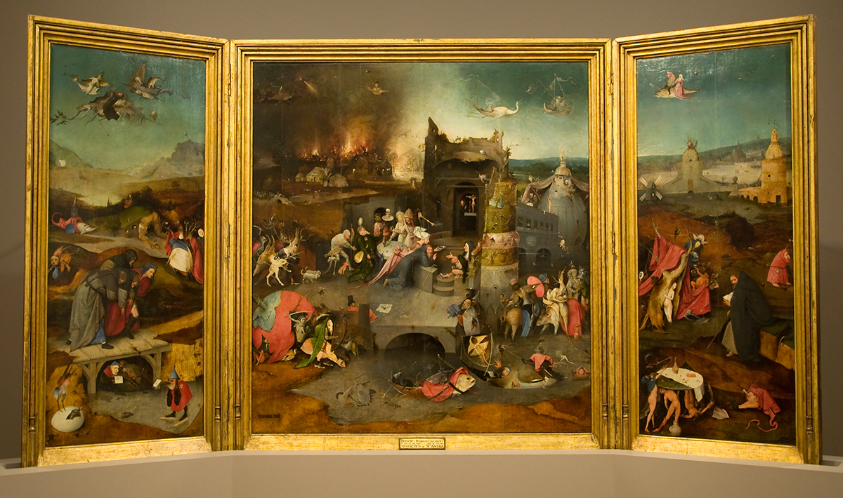The full three panel triptych of the Temptation of St Anthony by Hieronymus Bosch